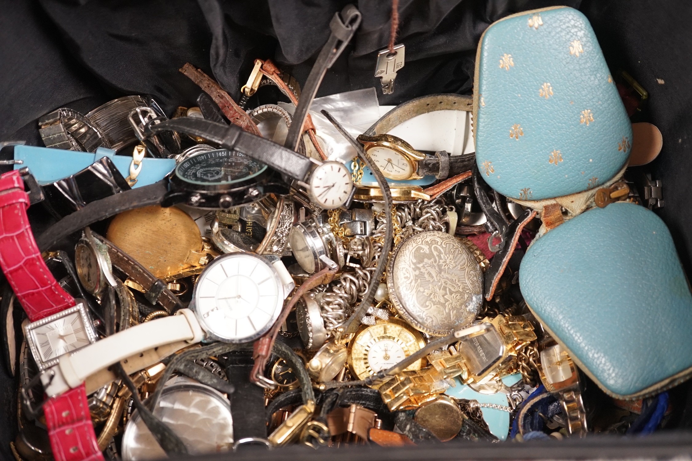 A group of assorted mainly modern lady's wrist watches, including some gentleman's and some pocket watches.